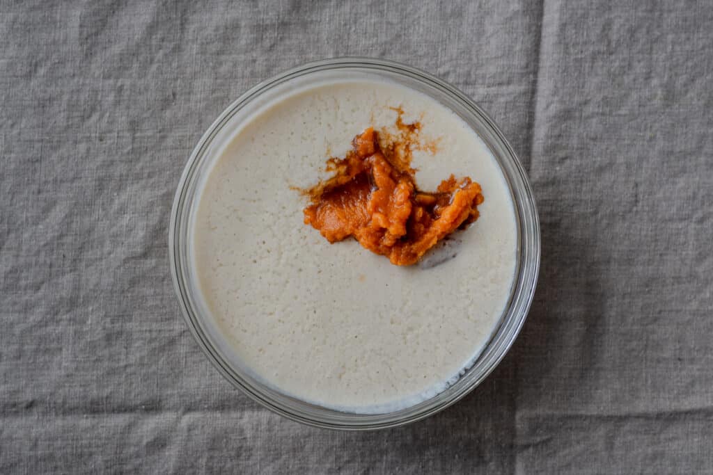 pumpkin puree in a bowl of buttermilk