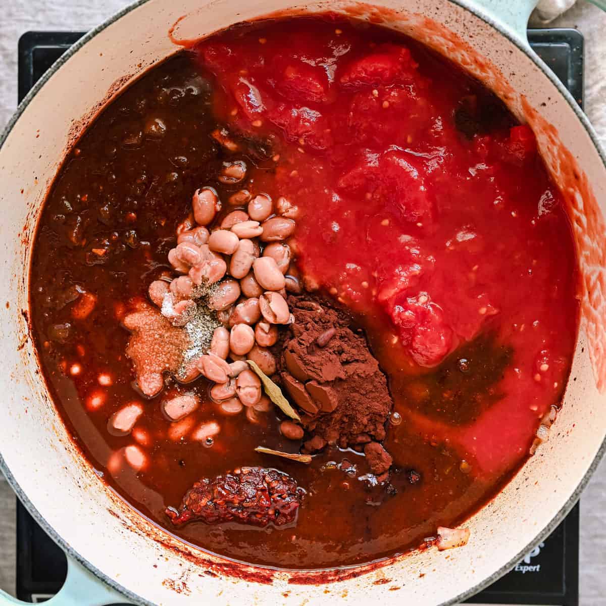 tomatoes added to the pot.