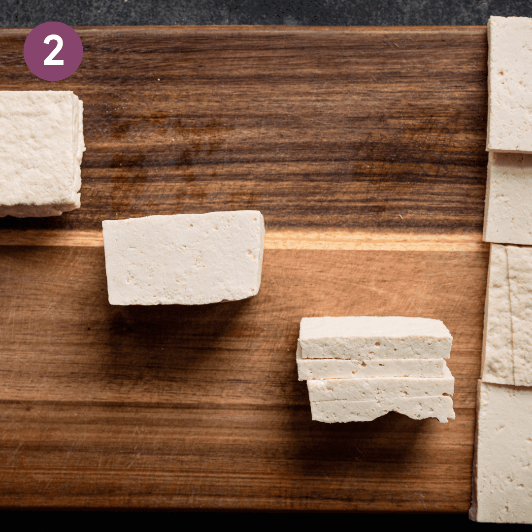 Tofu slabs cut into slices from the squares.