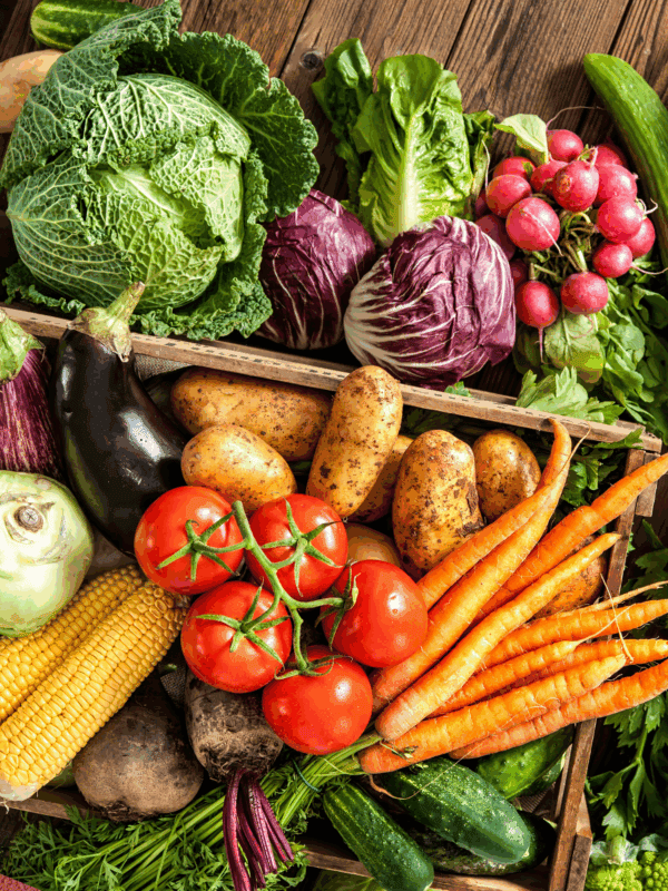 beautiful spread of fresh produce on wooden table.