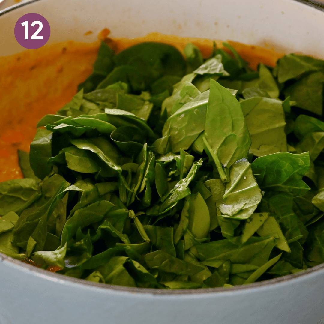 spinach added to soup pot.