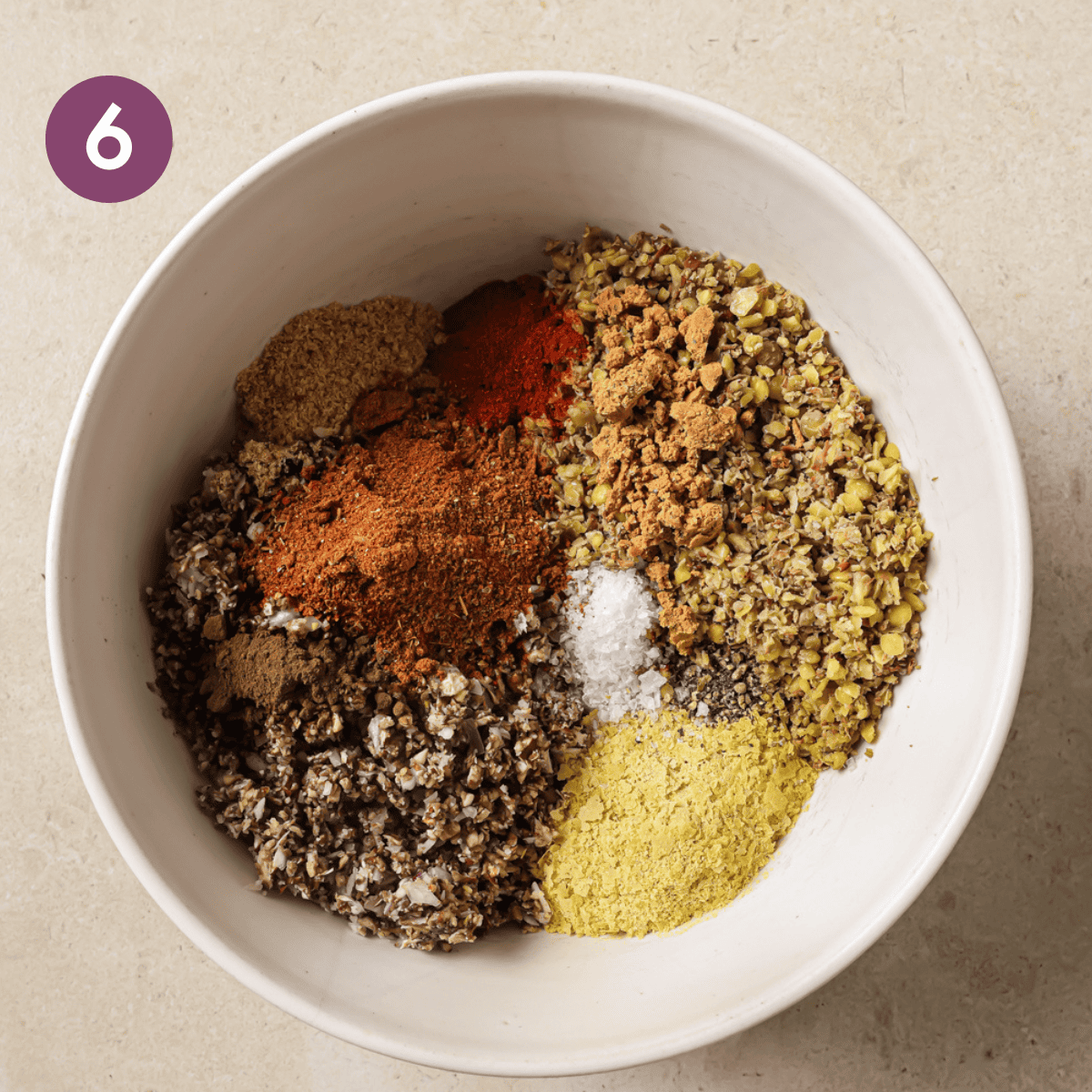 groups of ingredients for vegan tacos in a white bowl.